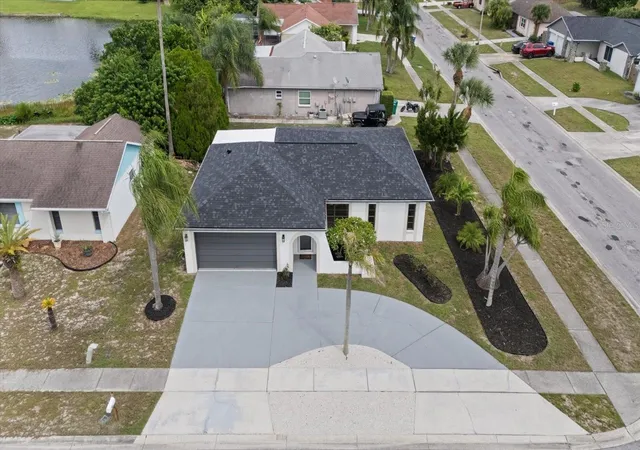 Photo 2 of Single family home for sale at 1016 Fuchsia Dr, Holiday, FL 34691 | MLS# TB8552589 | Listing updated on 2026-10-05