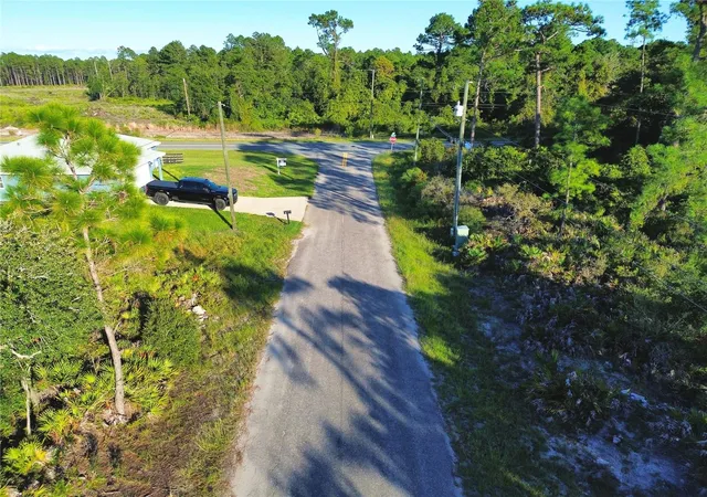 Photo 4 of Land for sale at Tbd Fisher Loop Pass, Ocklawaha, FL 32179 | MLS# OM732955 | Listing updated on 2026-09-27