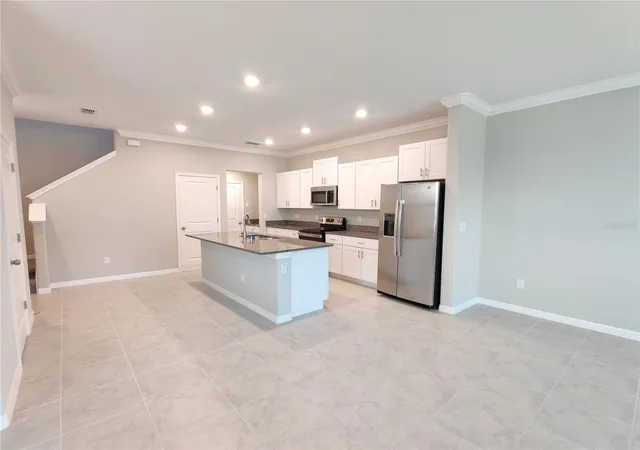 Photo 3 of Townhouse for sale at 31576 Blue Passing Loop, Wesley Chapel, FL 33545 | MLS# TB8552599 | Listing updated on 2026-09-28