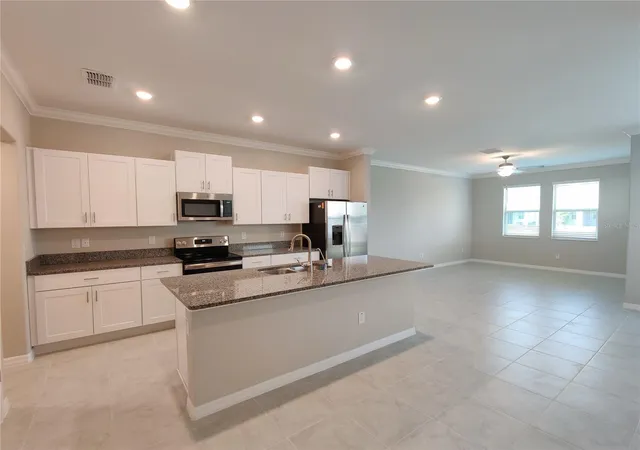 Photo 4 of Townhouse for sale at 31576 Blue Passing Loop, Wesley Chapel, FL 33545 | MLS# TB8552599 | Listing updated on 2026-09-28