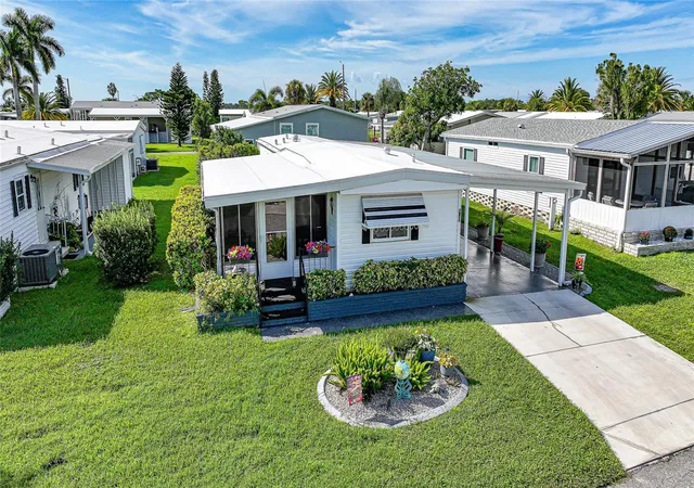 Photo 2 of Manufactured home for sale at 635 Blackburn Blvd, North Port, FL 34287 | MLS# C7531264 | Listing updated on 2026-10-07