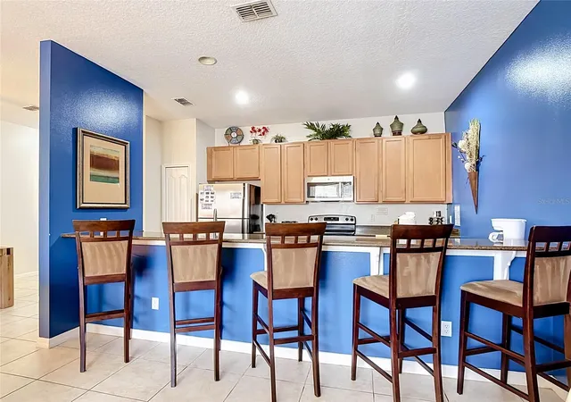 Photo 3 of Townhouse for sale at 8956 Candy Palm Rd, Kissimmee, FL 34747 | MLS# O6445182 | Listing updated on 2026-09-28