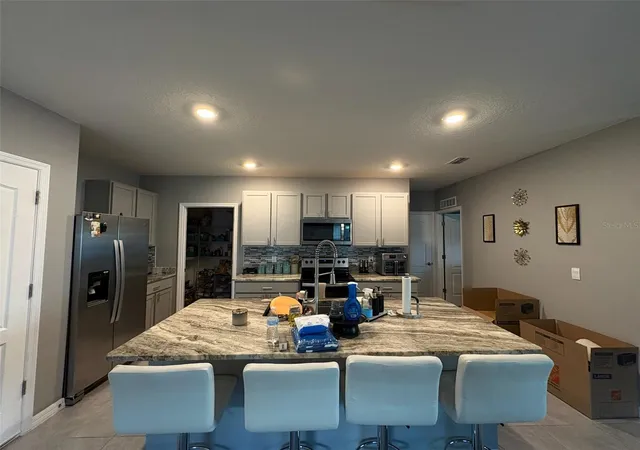 Photo 2 of Single family home for sale at 928 August Sky Dr, Deltona, FL 32738 | MLS# O6445197 | Listing updated on 2026-10-08