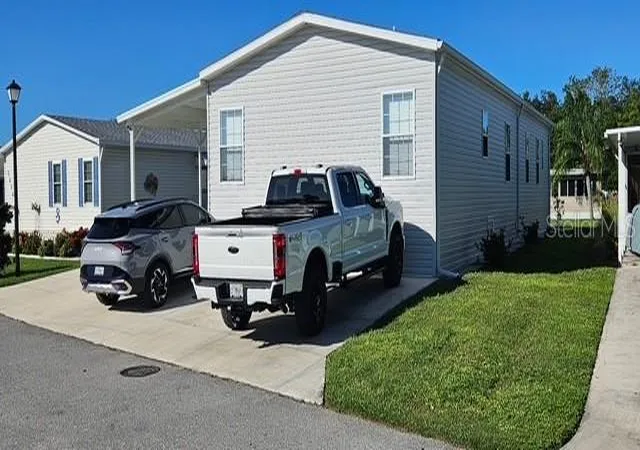 Photo 2 of Manufactured home for sale at 5652 Holiday Park Blvd, North Port, FL 34287 | MLS# C7531267 | Listing updated on 2026-10-11