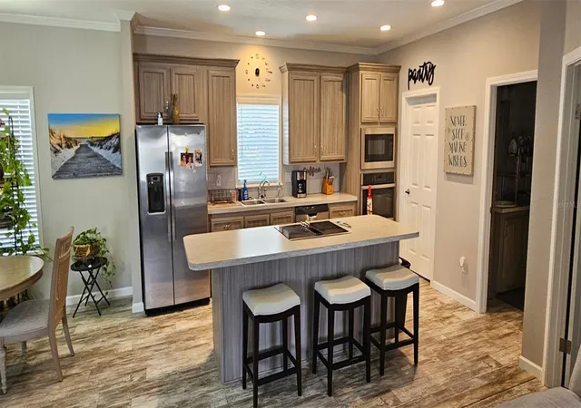 Photo 3 of Manufactured home for sale at 5652 Holiday Park Blvd, North Port, FL 34287 | MLS# C7531267 | Listing updated on 2026-10-11