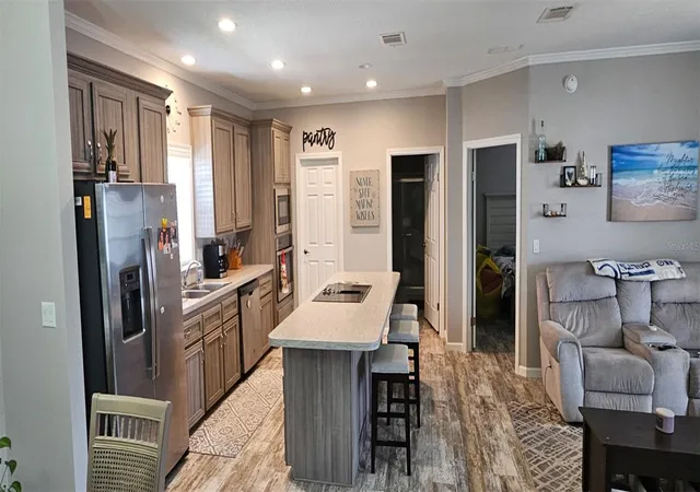Photo 4 of Manufactured home for sale at 5652 Holiday Park Blvd, North Port, FL 34287 | MLS# C7531267 | Listing updated on 2026-10-11
