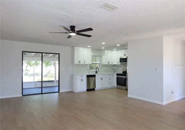 Photo 3 of Single family home for sale at 9353 Chase St, Spring Hill, FL 34606 | MLS# W7889872 | Listing updated on 2026-10-16