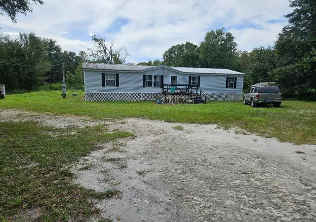 Photo 1 of Manufactured home for sale at 12430 Country Pl Rd, Lakeland, FL 33809 | MLS# P4940015 | Listing updated on 2026-10-03