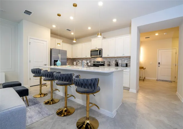 Photo 4 of Townhouse for sale at 1248 Blue Is Dr, Clermont, FL 34714 | MLS# O6445212 | Listing updated on 2026-10-21