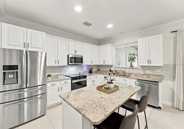 Photo 2 of Single family home for sale at 506 Berry James Ct, Kissimmee, FL 34744 | MLS# O6445214 | Listing updated on 2026-10-07