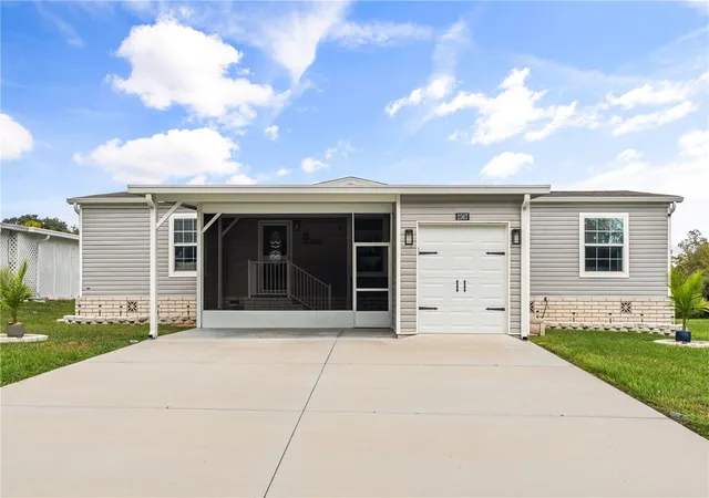 Photo 1 of Manufactured home for sale at 2567 Cayman Cir #R25, Zellwood, FL 32798 | MLS# O6445225 | Listing updated on 2026-10-08