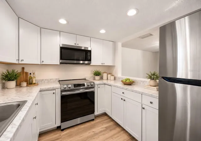 Photo 4 of Townhouse for sale at 152 Douglas Rd W #A, Oldsmar, FL 34677 | MLS# TB8552675 | Listing updated on 2026-10-03