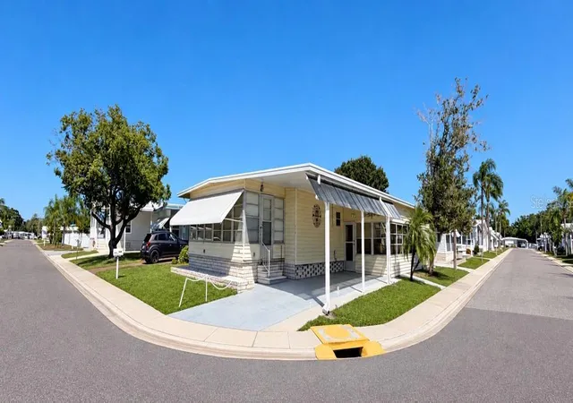 Photo 2 of Manufactured home for sale at 1100 Belcher Rd S #719, Largo, FL 33771 | MLS# TB8552684 | Listing updated on 2026-09-30