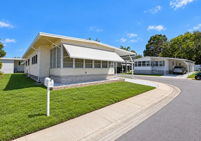 Photo 3 of Manufactured home for sale at 1100 Belcher Rd S #719, Largo, FL 33771 | MLS# TB8552684 | Listing updated on 2026-09-30