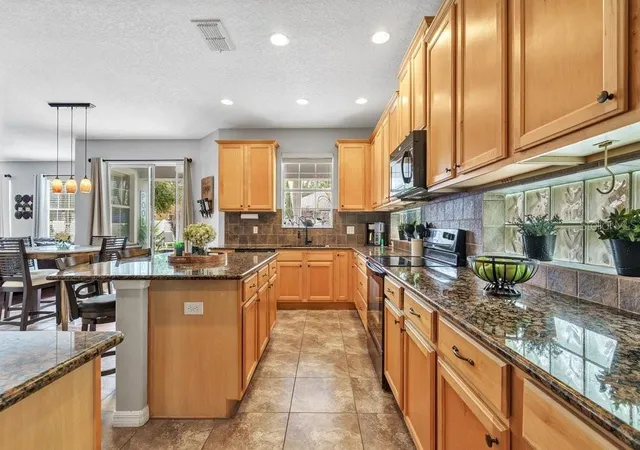 Photo 4 of Single family home for sale at 8840 Abbey Leaf Ln, Orlando, FL 32827 | MLS# O6445241 | Listing updated on 2026-10-10
