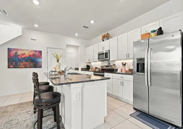 Photo 4 of Townhouse for sale at 10824 Fanning Springs Ct, Tampa, FL 33647 | MLS# TB8552699 | Listing updated on 2026-09-30