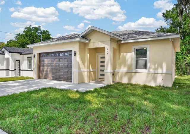 Photo 1 of Single family home for sale at 613 W Valencia St, Lakeland, FL 33805 | MLS# TB8552711 | Listing updated on 2026-09-30