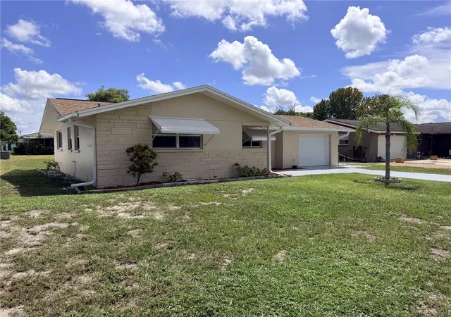 Photo 3 of Single family home for sale at 10118 Holly Dr, Port Richey, FL 34668 | MLS# TB8552719 | Listing updated on 2026-09-29