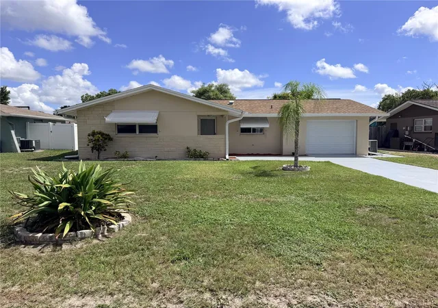 Photo 3 of Single family home for sale at 10118 Holly Dr, Port Richey, FL 34668 | MLS# TB8552719 | Listing updated on 2026-09-29