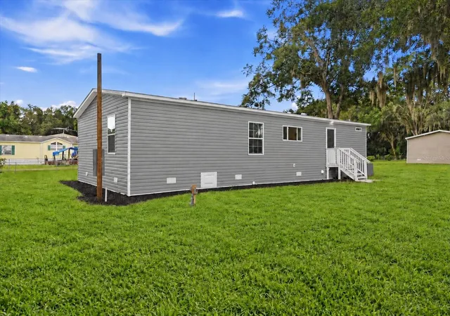 Photo 4 of Manufactured home for sale at 1228 Sparton Ave, Port Orange, FL 32127 | MLS# P4940017 | Listing updated on 2026-10-03