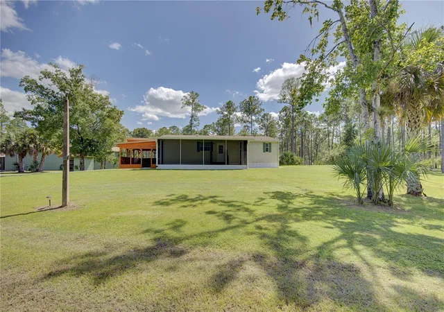 Photo 1 of Manufactured home for sale at 420 Smith Rd, Osteen, FL 32764 | MLS# O6445296 | Listing updated on 2026-09-29