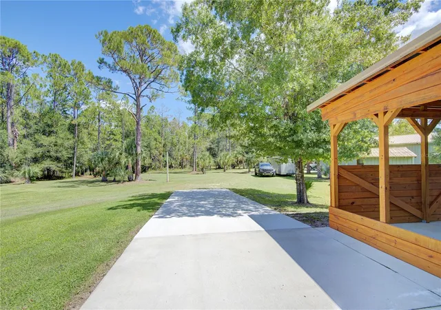 Photo 3 of Manufactured home for sale at 420 Smith Rd, Osteen, FL 32764 | MLS# O6445296 | Listing updated on 2026-09-29