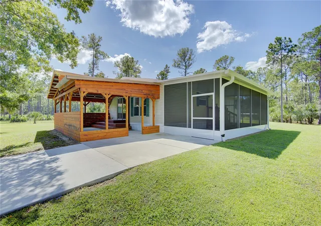 Photo 4 of Manufactured home for sale at 420 Smith Rd, Osteen, FL 32764 | MLS# O6445296 | Listing updated on 2026-09-29