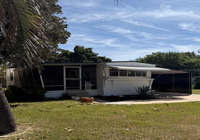 Photo 3 of Manufactured home for sale at 1931 Nw 29th Court, Ocala, FL 34475 | MLS# OM732990 | Listing updated on 2026-09-29