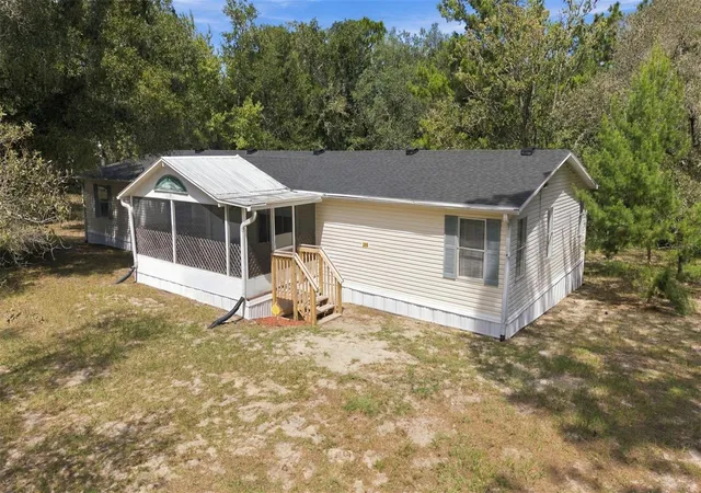 Photo 2 of Manufactured home for sale at 293 E Shawna Ct, Hernando, FL 34442 | MLS# OM732991 | Listing updated on 2026-09-29
