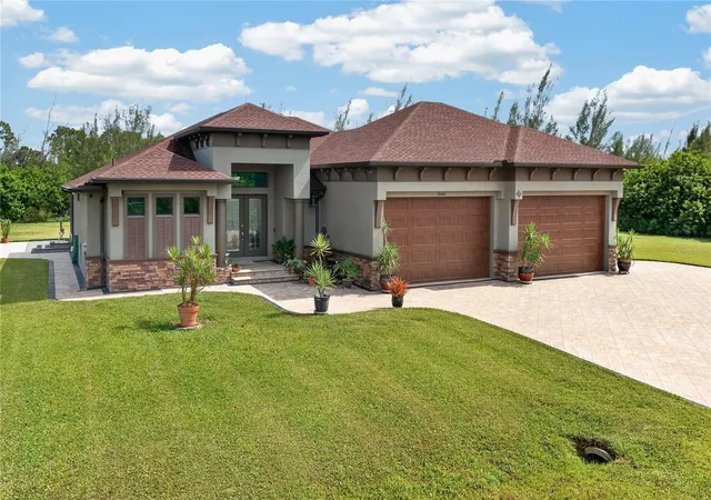 Photo 1 of Single family home for sale at 10451 Hatchett Cir, Port Charlotte, FL 33981 | MLS# C7531286 | Listing updated on 2026-10-23
