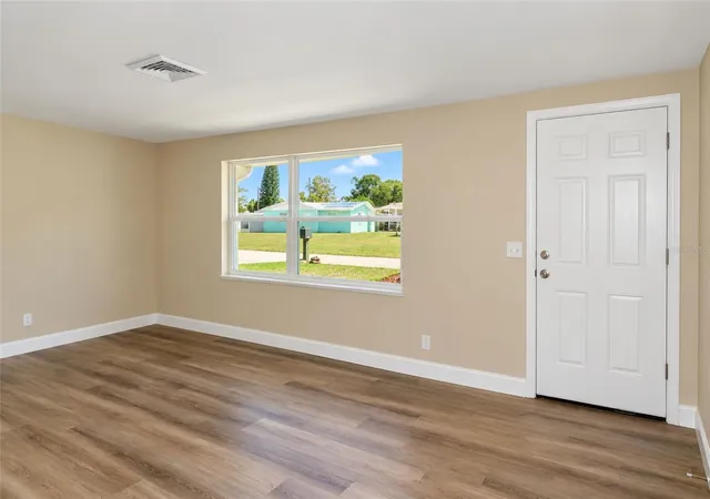 Photo 2 of Single family home for sale at 3521 Kimberly Oaks Dr, Holiday, FL 34691 | MLS# TB8552753 | Listing updated on 2026-10-07