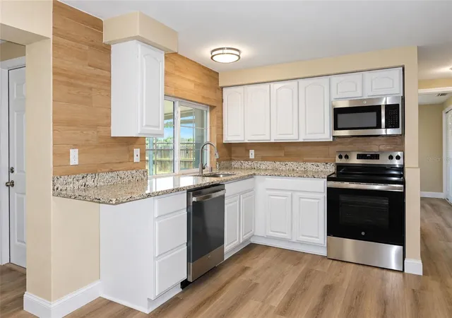 Photo 3 of Single family home for sale at 3521 Kimberly Oaks Dr, Holiday, FL 34691 | MLS# TB8552753 | Listing updated on 2026-10-07