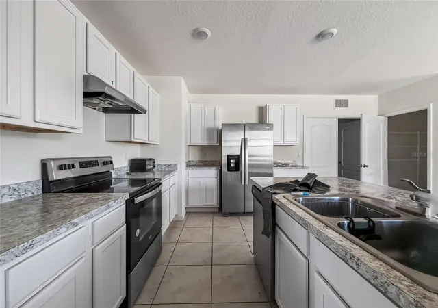 Photo 4 of Single family home for sale at 1657 Rosy Dale Cir, Davenport, FL 33837 | MLS# O6445316 | Listing updated on 2026-09-29