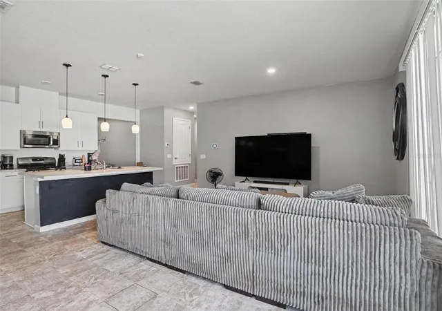 Photo 3 of Single family home for sale at 156 Arlington Sq Ct, Haines City, FL 33844 | MLS# TB8552766 | Listing updated on 2026-10-08