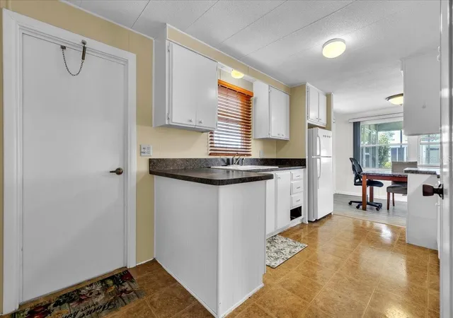 Photo 3 of Manufactured home for sale at 24437 Harborview Rd #27, Port Charlotte, FL 33980 | MLS# C7531303 | Listing updated on 2026-10-01