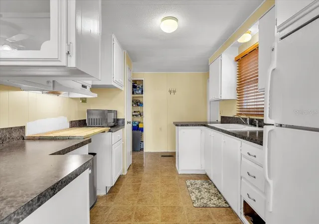 Photo 4 of Manufactured home for sale at 24437 Harborview Rd #27, Port Charlotte, FL 33980 | MLS# C7531303 | Listing updated on 2026-10-01