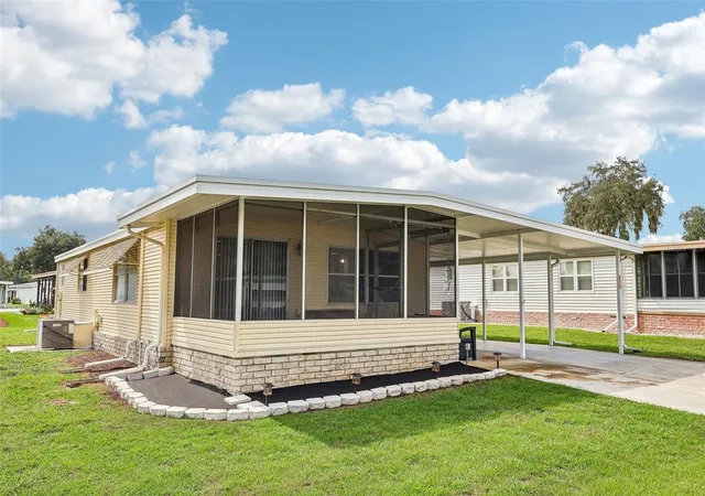 Photo 2 of Manufactured home for sale at 411 Palo Verde Dr, Leesburg, FL 34748 | MLS# G5118362 | Listing updated on 2026-10-10