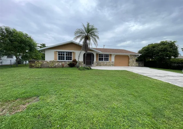 Photo 3 of Single family home for sale at 517 Skylark Ln Nw, Port Charlotte, FL 33952 | MLS# C7531308 | Listing updated on 2026-10-04