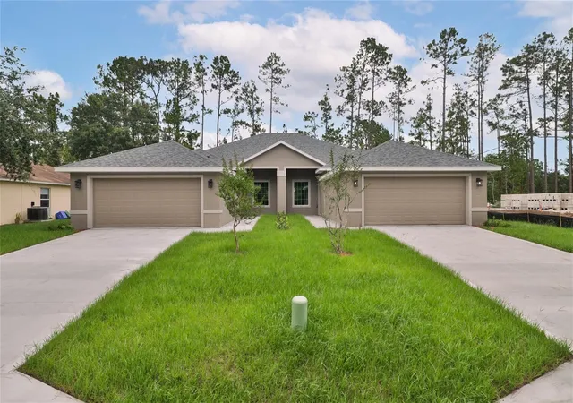 Multi family home for sale at 51 Providence Ln #A, B, PALM COAST, FL 32164 | MLS# FC321745