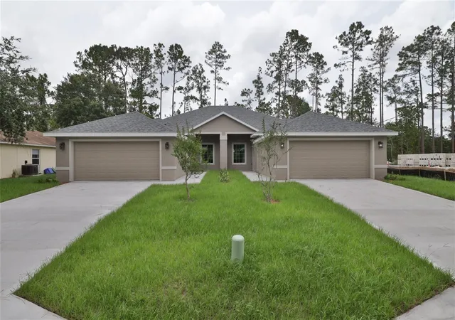 Photo 2 of Multi family home for sale at 51 Providence Ln #A, B, Palm Coast, FL 32164 | MLS# FC321745 | Listing updated on 2026-10-01