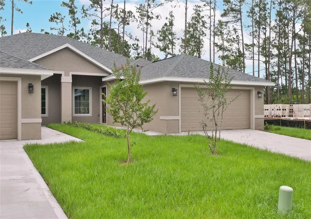 Photo 3 of Multi family home for sale at 51 Providence Ln #A, B, Palm Coast, FL 32164 | MLS# FC321745 | Listing updated on 2026-10-01