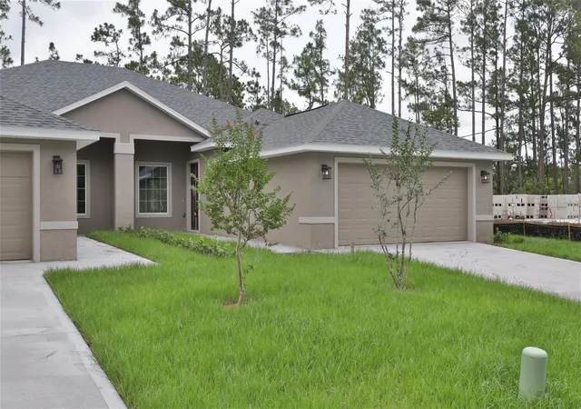 Photo 3 of House for sale at 51 Providence Ln #A, B, Palm Coast, FL 32164 | MLS# FC321745 | Listing updated on 2026-10-01