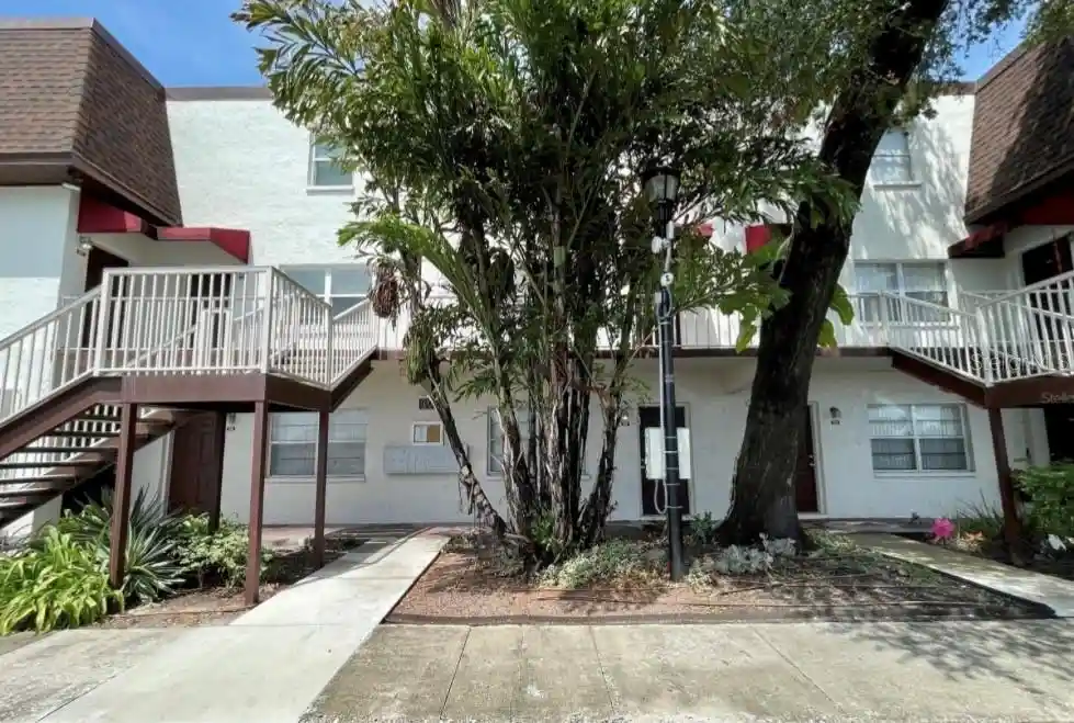 Listing Photo 1 - Condo for sale in 9209 Tudor Dr located at 9209 Tudor Dr, TAMPA, FL 33615 - Unit #C203