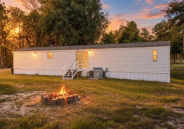 Photo 1 of Manufactured home for sale at 10898 NE 220th Street, Fort Mc Coy, FL 32134 | MLS# TB8552848 | Listing updated on 2026-09-29