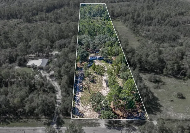 Photo 2 of Manufactured home for sale at 10898 NE 220th Street, Fort Mc Coy, FL 32134 | MLS# TB8552848 | Listing updated on 2026-09-29