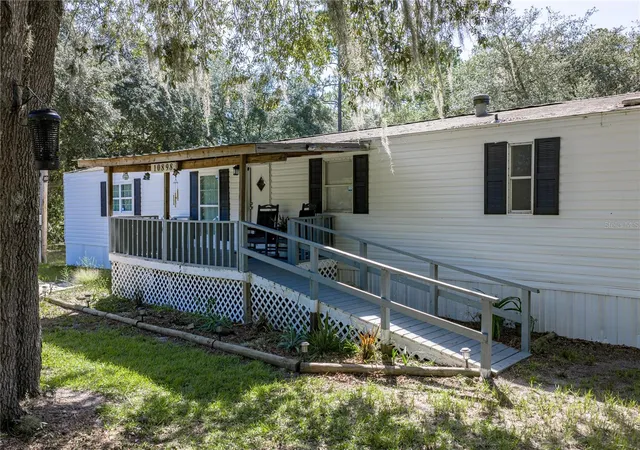 Photo 3 of Manufactured home for sale at 10898 NE 220th Street, Fort Mc Coy, FL 32134 | MLS# TB8552848 | Listing updated on 2026-09-29