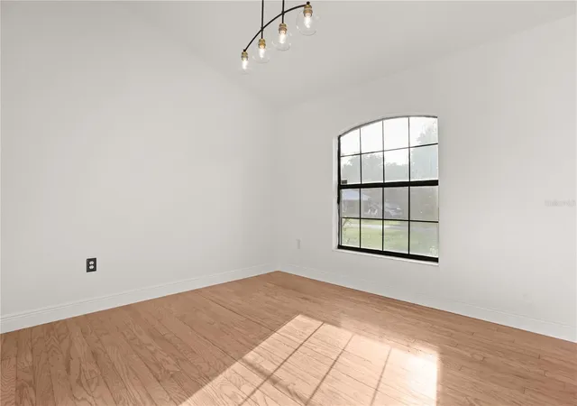 Photo 3 of Single family home for sale at 141 Poinciana Ln, Deltona, FL 32738 | MLS# O6445401 | Listing updated on 2026-09-30