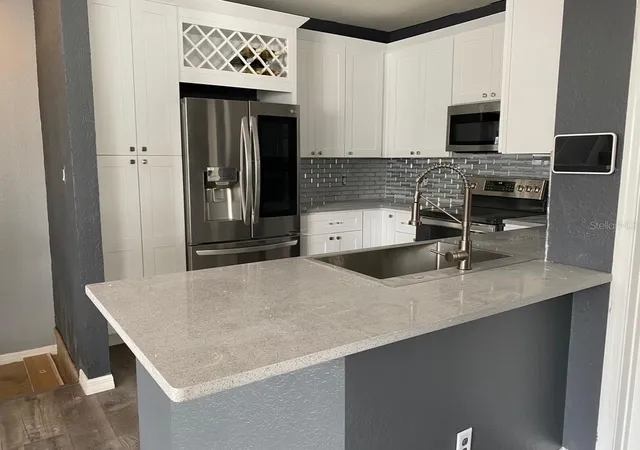 Photo 3 of Townhouse for sale at 2388 Grand Central Pkwy #8, Orlando, FL 32839 | MLS# O6445406 | Listing updated on 2026-10-21