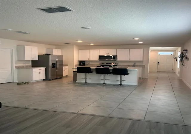 Photo 3 of Single family home for sale at 1560 Gladewater Rd, Kissimmee, FL 34744 | MLS# S5158436 | Listing updated on 2026-10-06