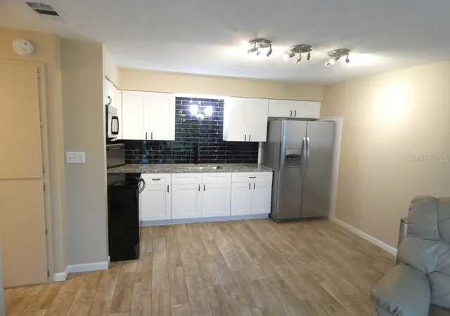 Photo 2 of Condo for sale at 4322 Tahitian Gdns Cir #B, Holiday, FL 34691 | MLS# W7889896 | Listing updated on 2026-09-30
